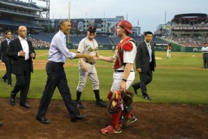 President Barack Obama greets players as he makes a visit to the Congressional baseball game at Nationals Park, on Thursday, June 11, 2015, in Washington (AP Photo/Evan Vucci)